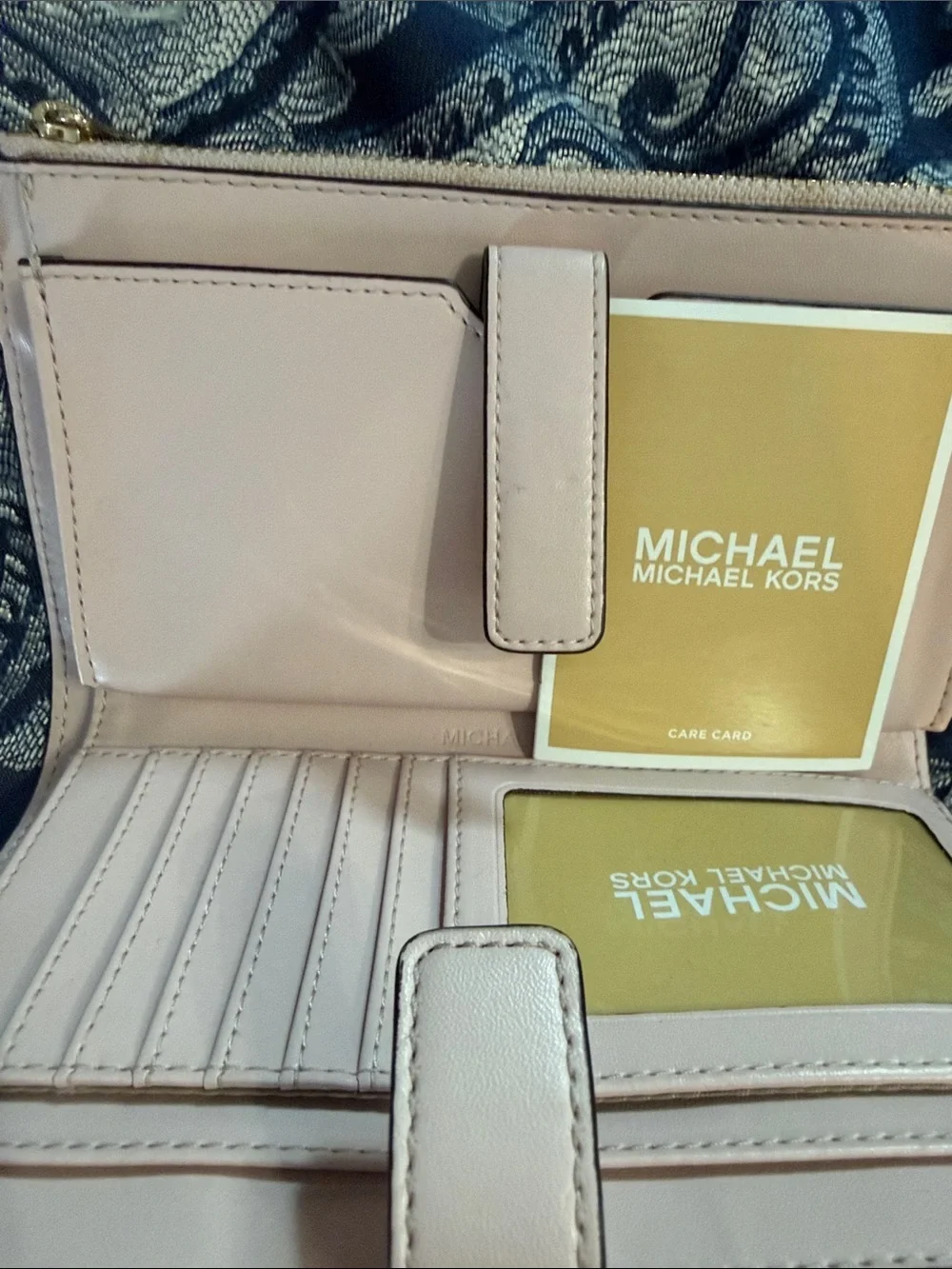 Michael Kors Brown Monogram Zip Wristlet with Gold Logo